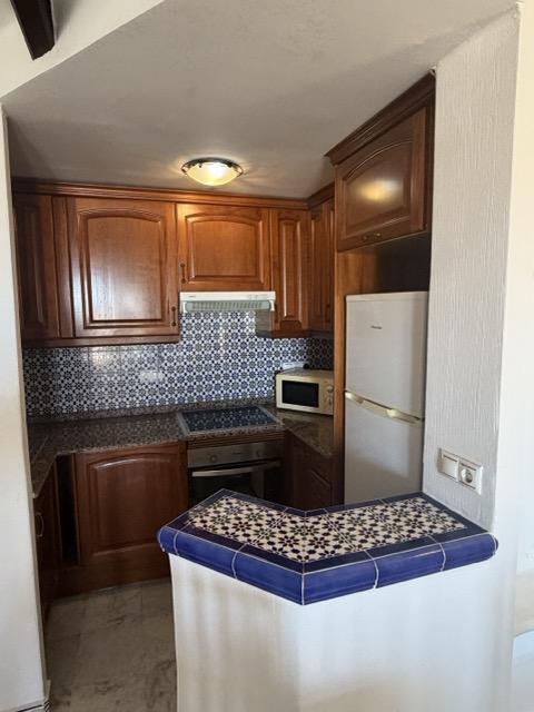 Kitchen with mosaic backsplash