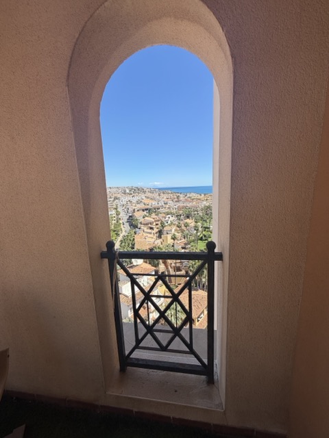 Sea view from arched window