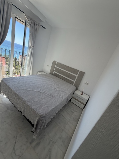 Bright bedroom with panoramic sea view