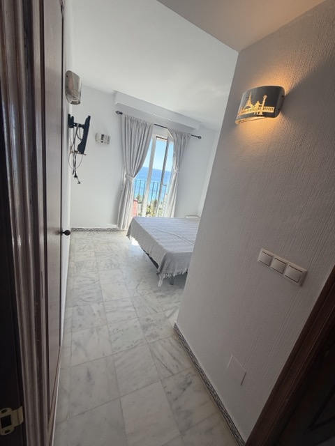 Bedroom opening onto the sea-view terrace