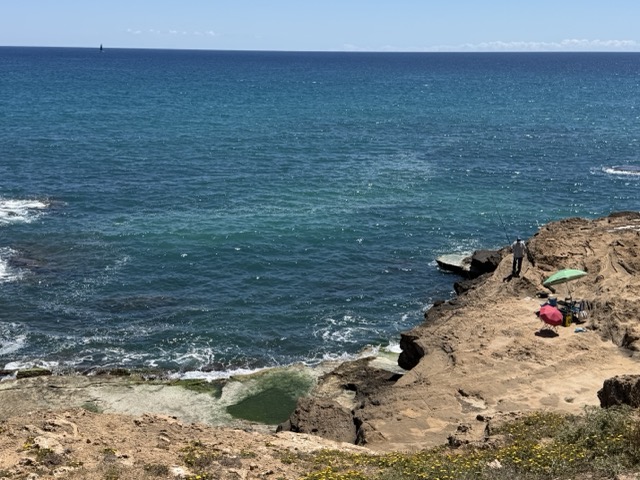 Rocky La Mata coastline with crystal-clear water